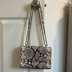 Tory Burch excellent condition snake print leather crossbody.